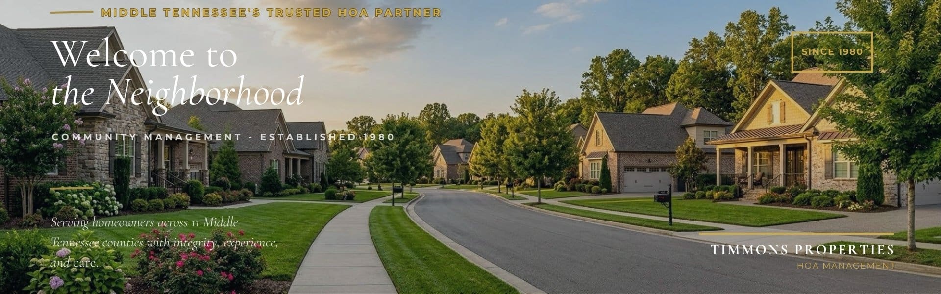 A suburban neighborhood with well-kept houses, manicured lawns, and a curved street, promoting Timmons Properties HOA management services in Middle Tennessee.